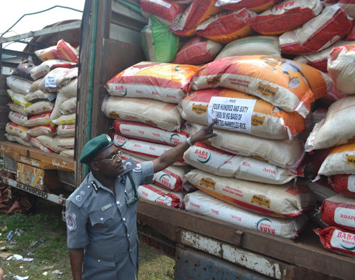 Buhari orders distribution of 150 truckloads of rice seized by customs to Nigerians