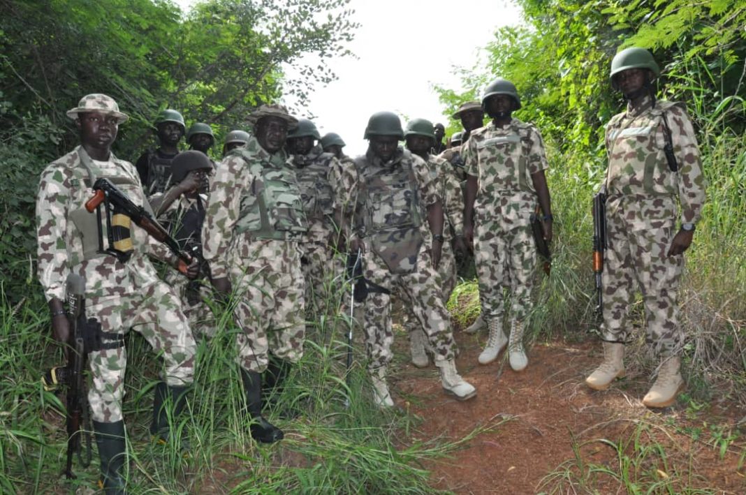 Military impounds smuggled rice, arrests four suspects