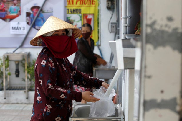 ‘Rice ATM’ feeds Vietnam’s poor during lockdown